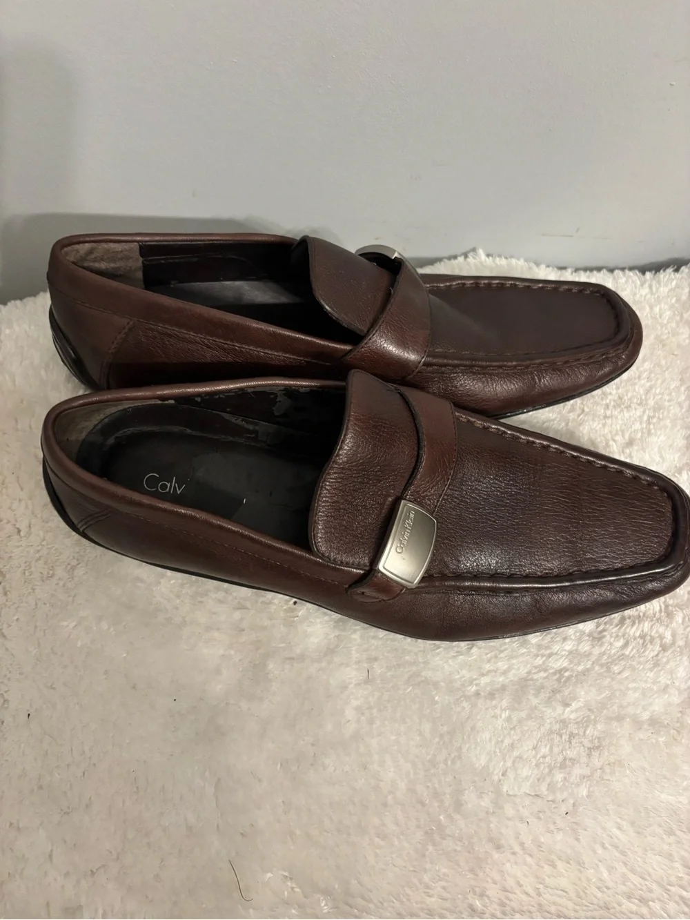 Calvin Klein Men's Dark Brown Leather Slip-Ons with Silver Logo Accent